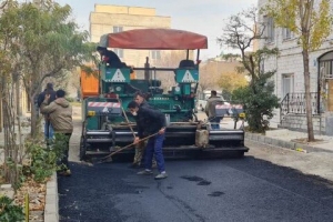 تصویر عملیات تراش و روکش آسفالت شهرک «بعثت» اجرا شد