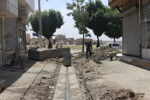 تصویر عملیات جدول‌گذاری کتابی و اصلاح آبرو در کوچه «هجرت۳ » انجام شد