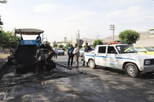 تصویر آغاز عملیات بهسازی و تراش روکش آسفالت بزرگراه شهید لشگری (جاده مخصوص)