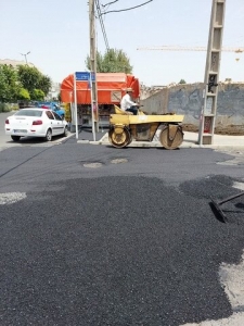 تصویر عملیات بهسازی و آسفالت معابر منطقه ۵ کرج ادامه دارد