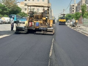 تصویر عملیات تراش و روکش مکانیزه آسفالت معابر فرعی محله «بنیاد» و «بلوار ظفر» اجرایی شد