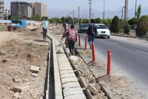 تصویر عملیات اصلاح هندسی و احداث دوربرگردان در بلوار ارم اجرایی شد