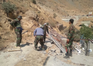 تصویر بخشی از اراضی ملی روستای حسنکدر واقع در جاده چالوس رفع تصرف شد