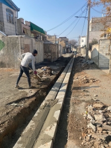 تصویر عملیات جدول گذاری در معابر و کوچه های سطح شهر هشتگرد