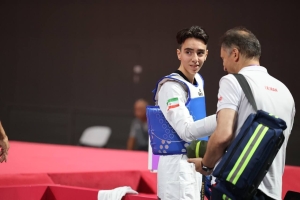 تصویر حاجی موسایی نایب قهرمان تکواندوی جهان در سلامت است