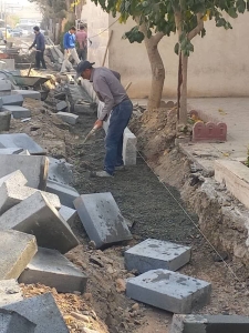 تصویر اجرای عملیات جدول‌گذاری کانیو و بهسازی خیابان آذرشرقی فردیس