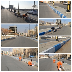 تصویر رنگ‌آمیزی جداول بلوار ۳۰ متری امام خمینی (ره) توسط شهرداری گلسار