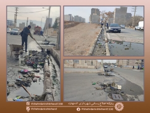 تصویر پاکسازی جوی‌ های شهرک ولی عصر (عج) اشتهارد